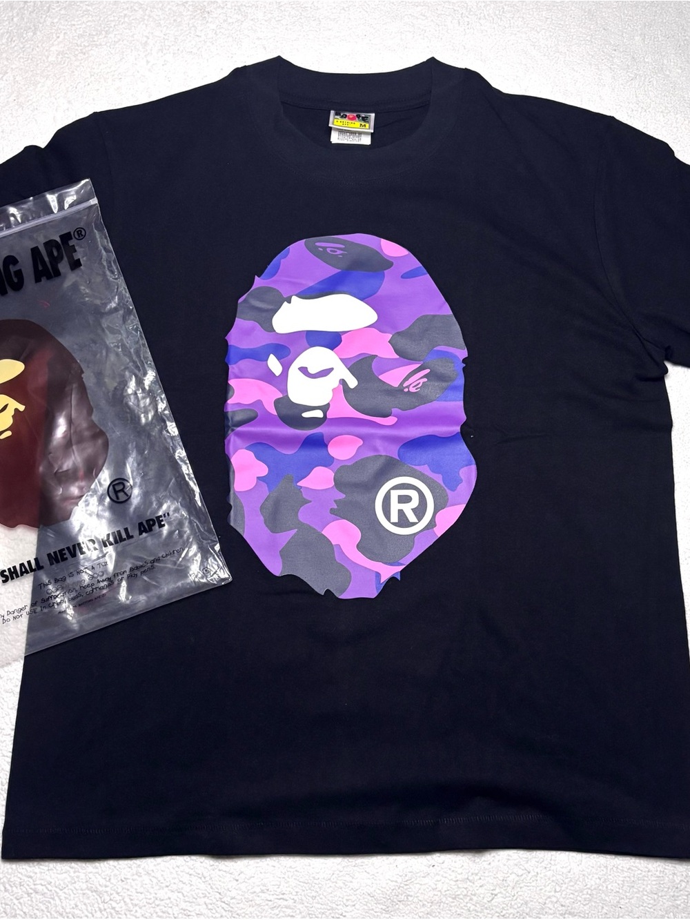 Bape Women's Black Tee with Purple Camo Ape Head